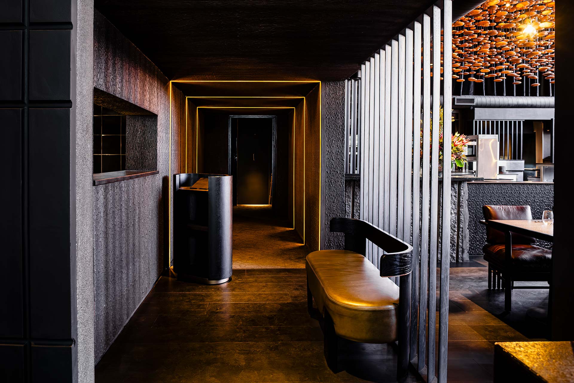 Fyn Restaurant in Cape Town with gold custom furniture design in reception area