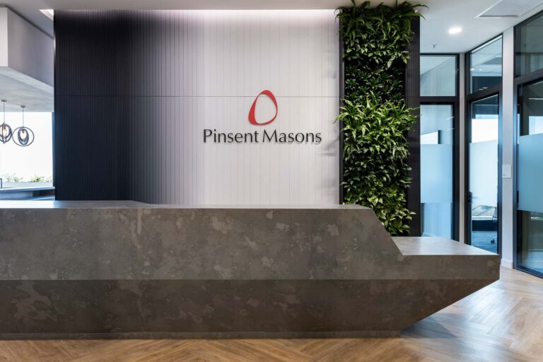 Pinsent Masons law office reception area with green wall design and fitout