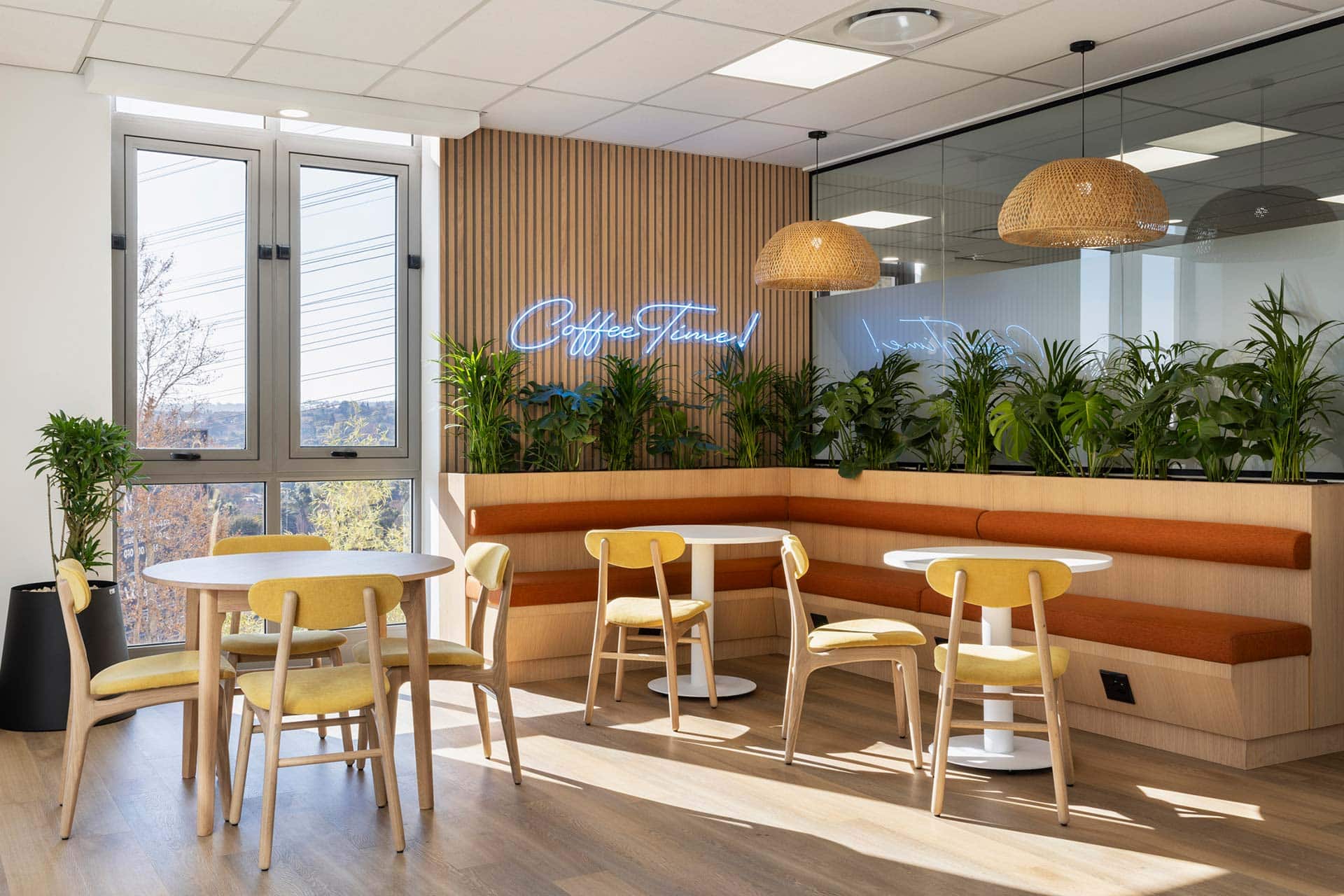 Sandoz pharmaceutical office canteen area design with modern furniture and custom seating