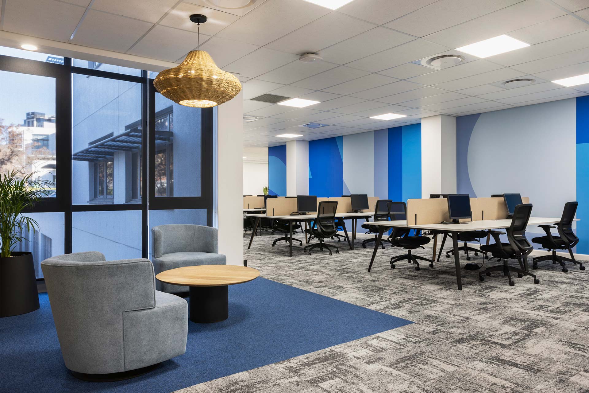 Sandoz commercial open plan office interior design in corporate colours