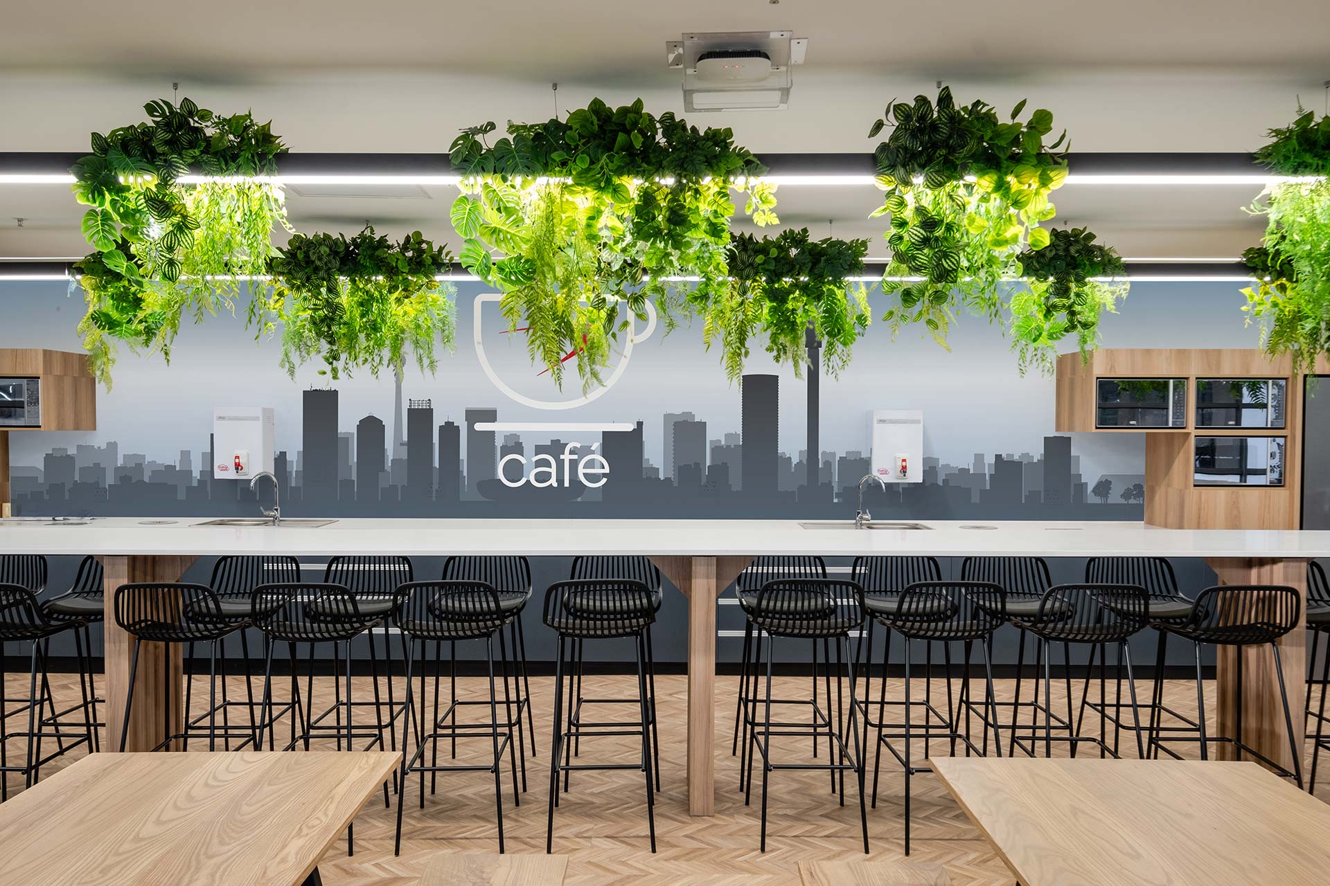 canteen office design with greenery for automobile financial company