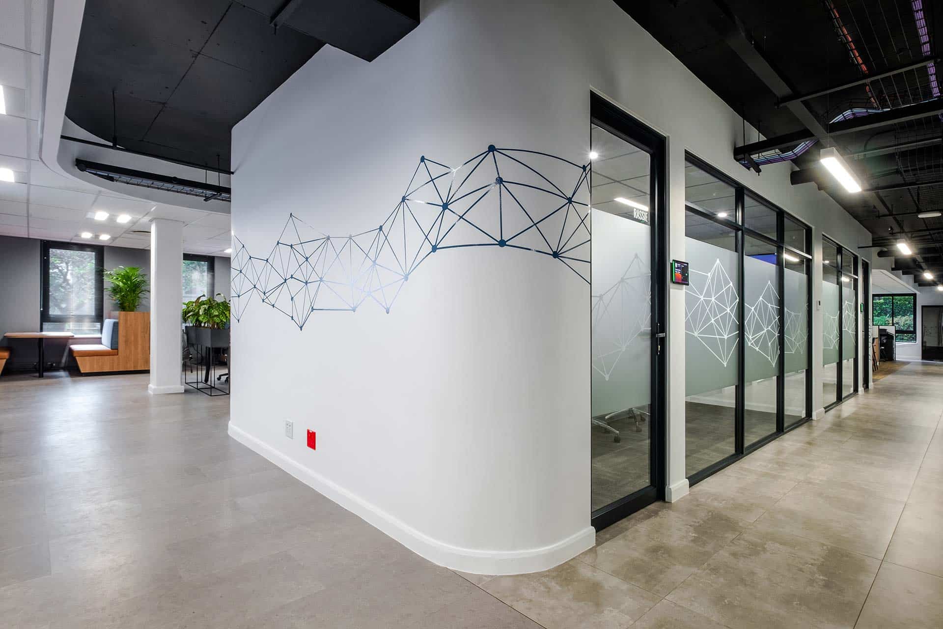 A branded wall from office designer for omega digital