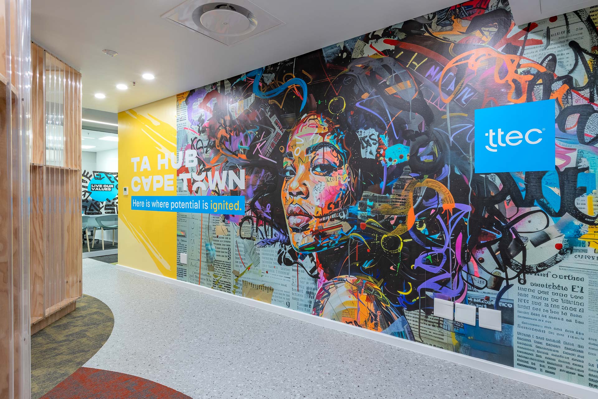 Colourful brand wall for ttec new office design fit-out