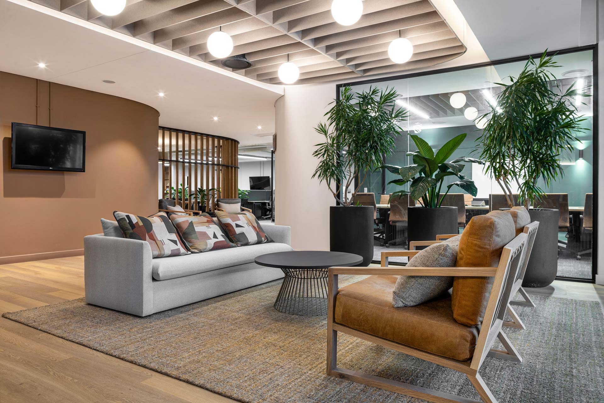 comfortable commercial furniture and warm office interior design