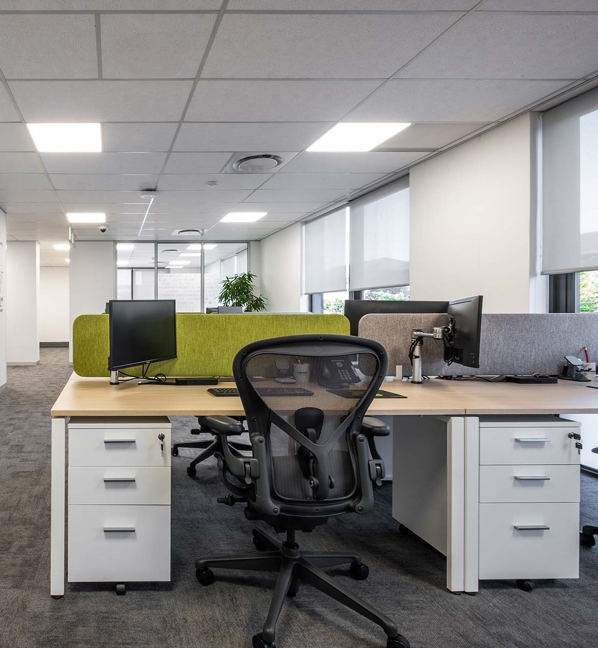 Open plan workspace design for private cybersecurity client