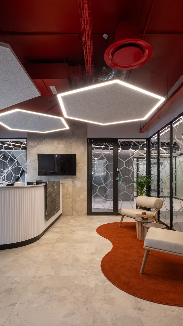 Red reception with waiting area furniture