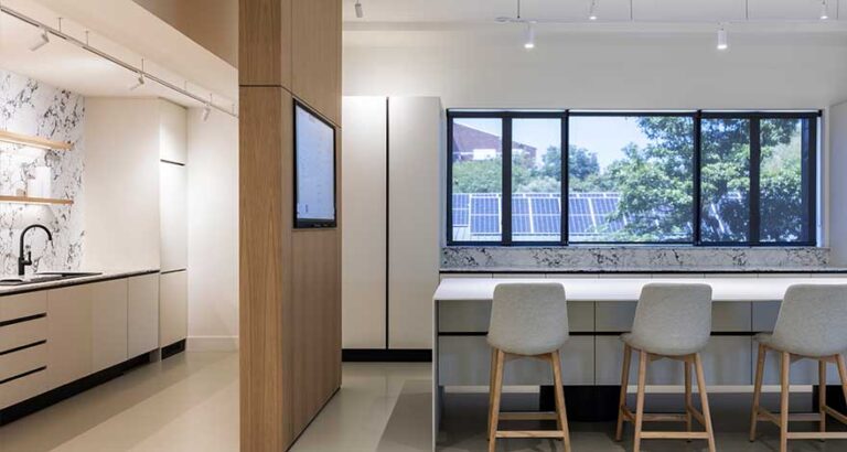 Sustainable office design integrating solar panels and grey water systems for ESG standards and compliance