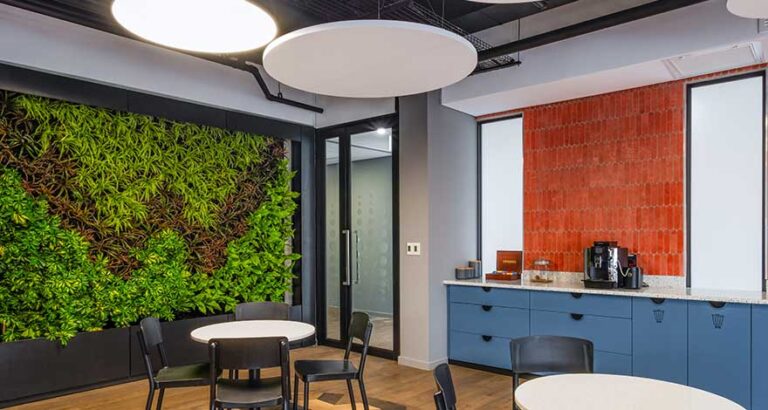 Commerical office canteen area including green wall signage installation