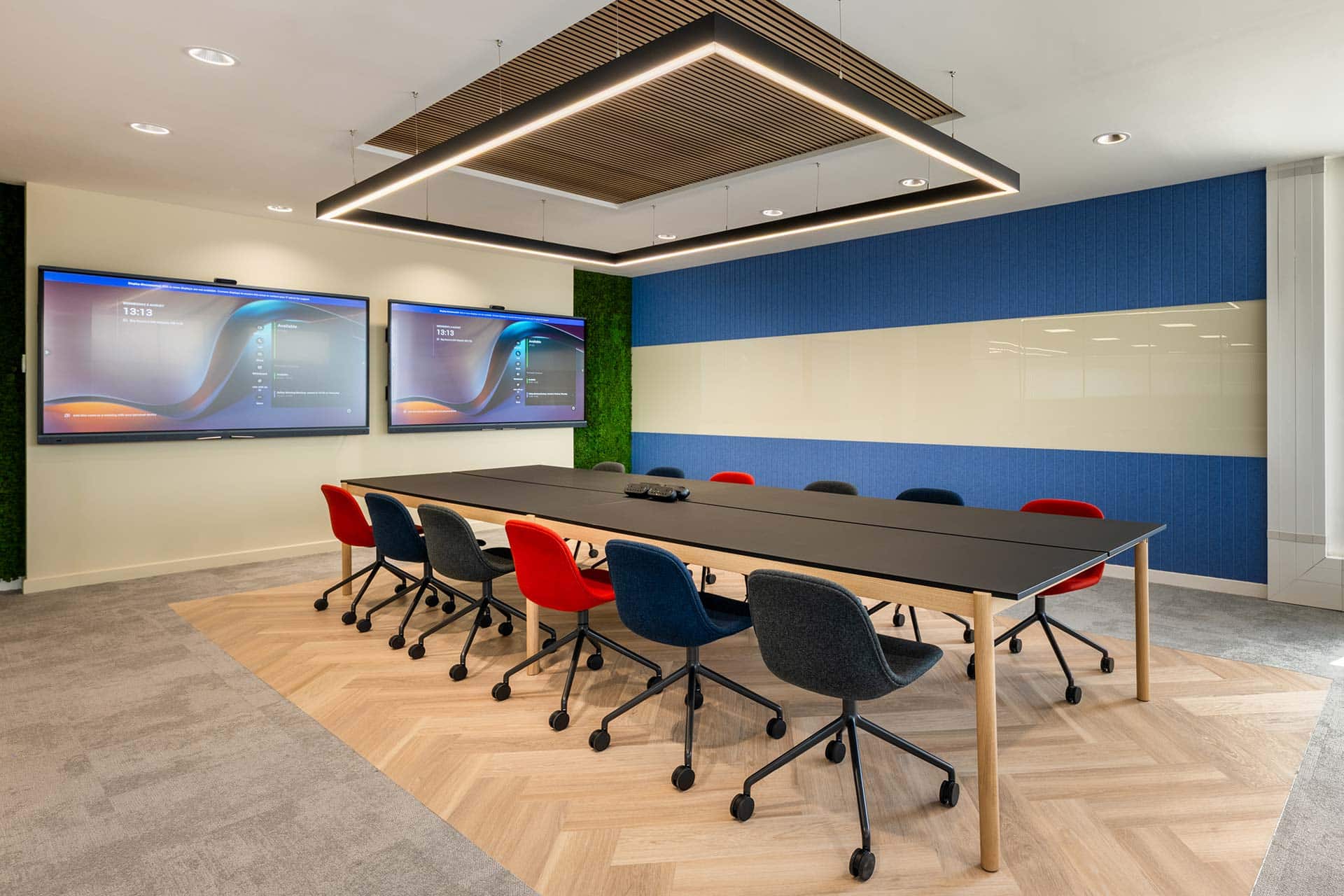 BA Euroflyer London office fit-out and interior design with large meeting room with modern conference table and colourful chairs