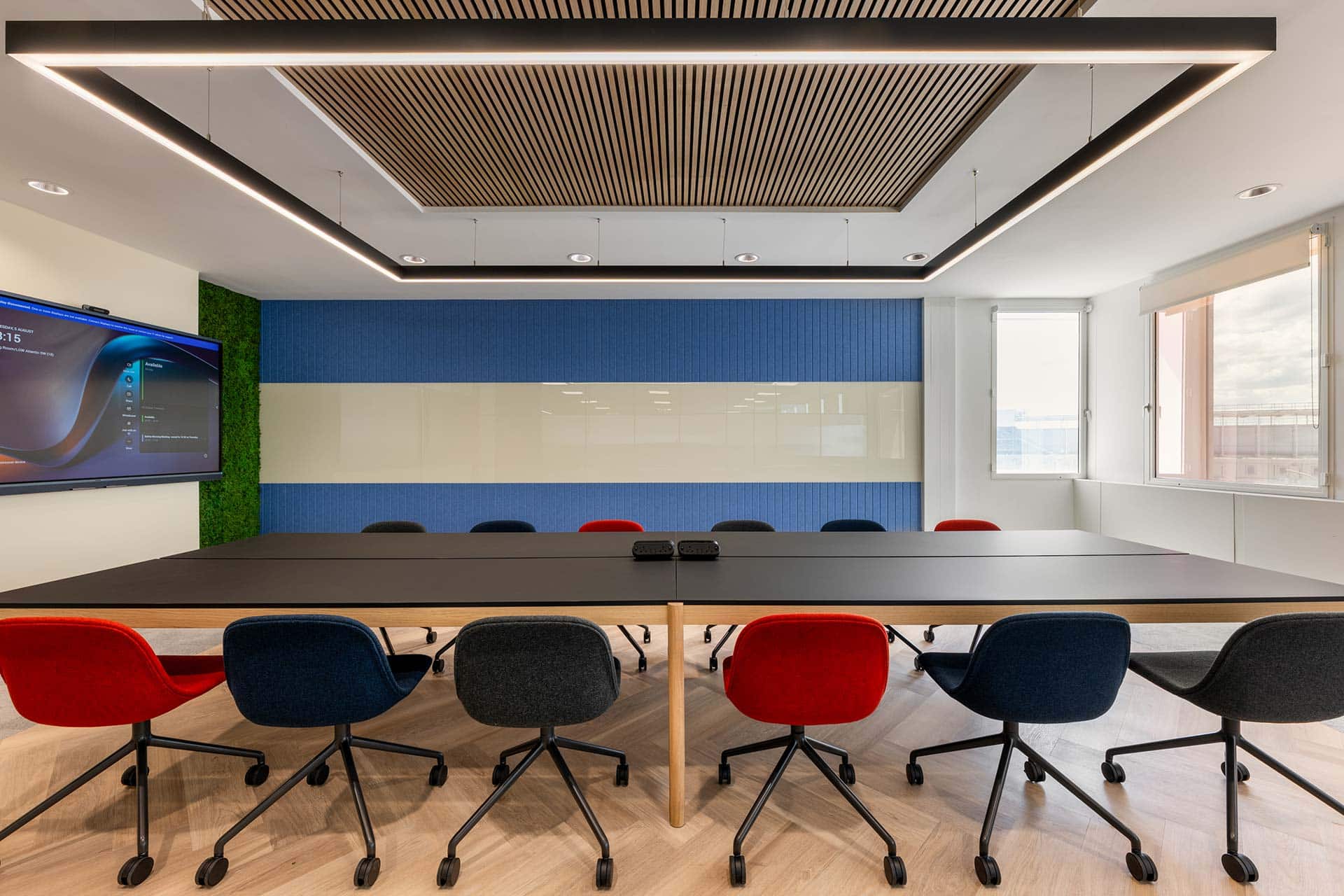 Modern BA Euroflyer meeting room fit-out and design with large conference table and ergonomic office chairs to suit the brand